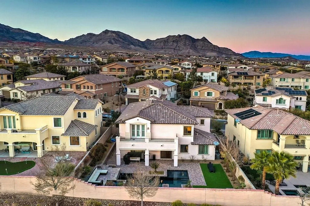 Aerial view of neighborhood with mountain range